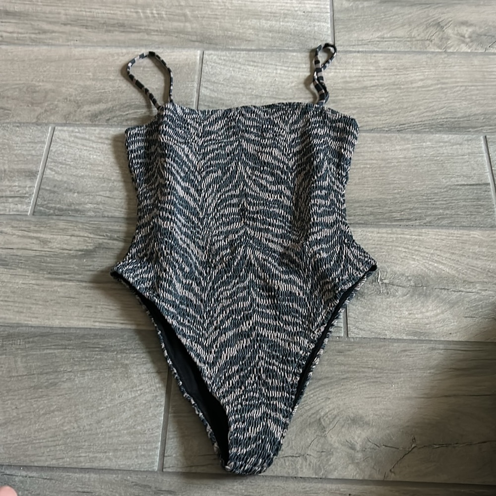 Wanderlust one piece smocked swim suit NWT